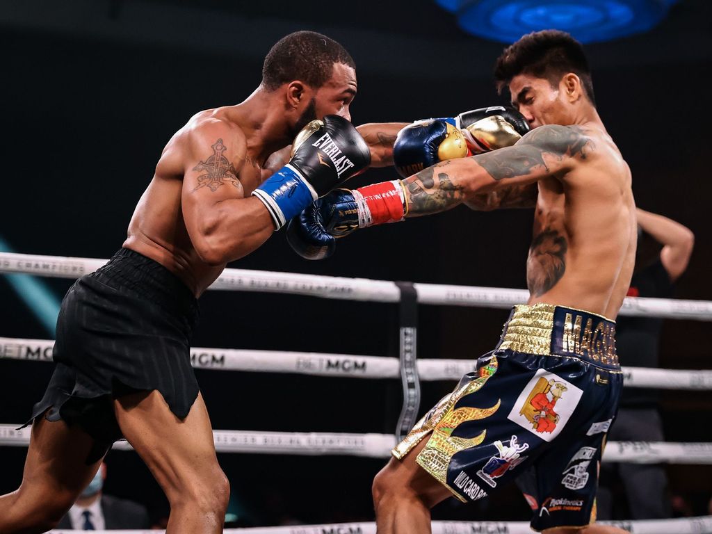 Mark Magsayo Dethrones Gary Russell Jr., Joins Childhood Idol Manny Pacquiao As A Filipino Champion Mark Magsayo Dethrones Gary Russell Jr., Joins Childhood Idol Manny Pacquiao As A Filipino Champion
